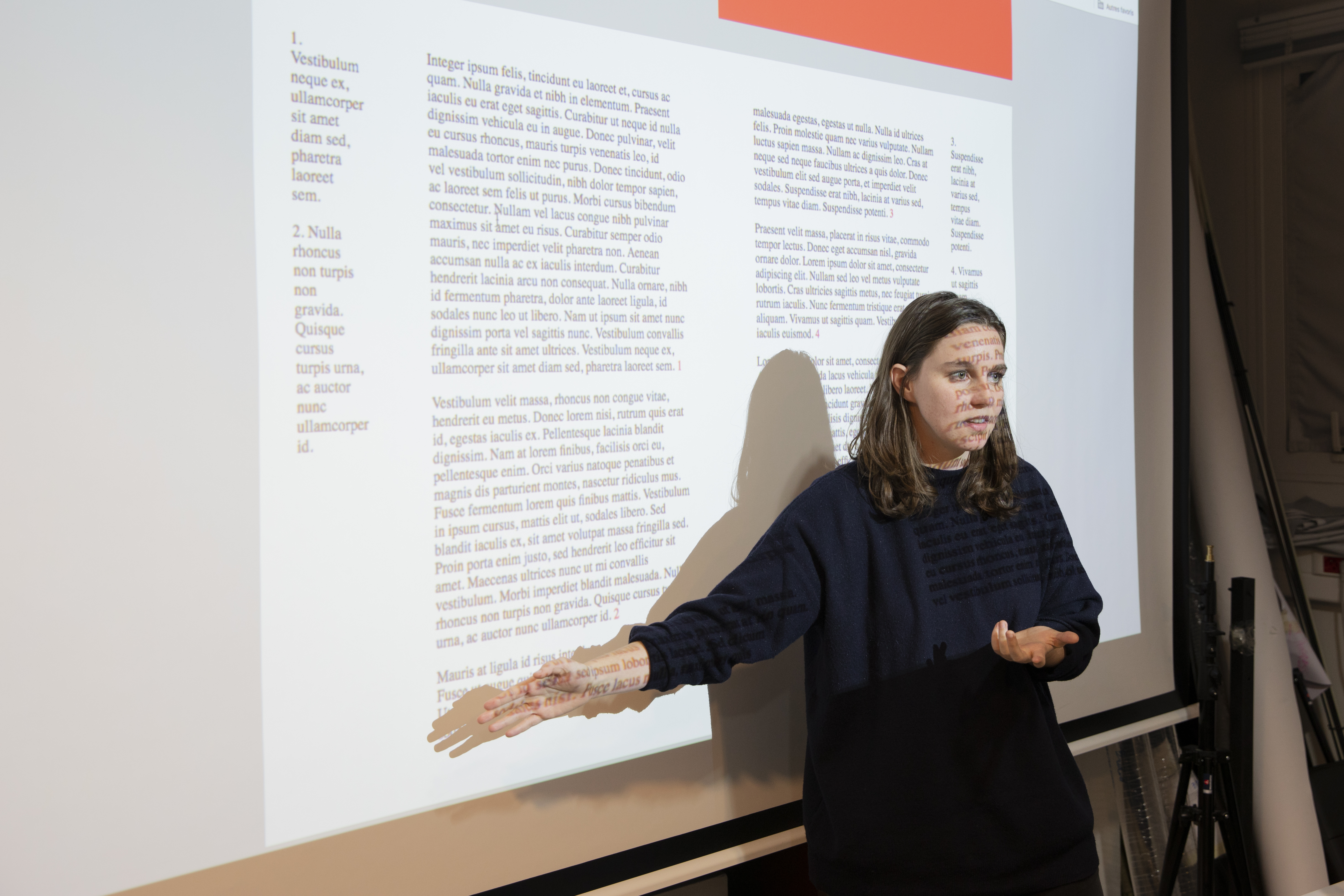 girl is presenting something in metting